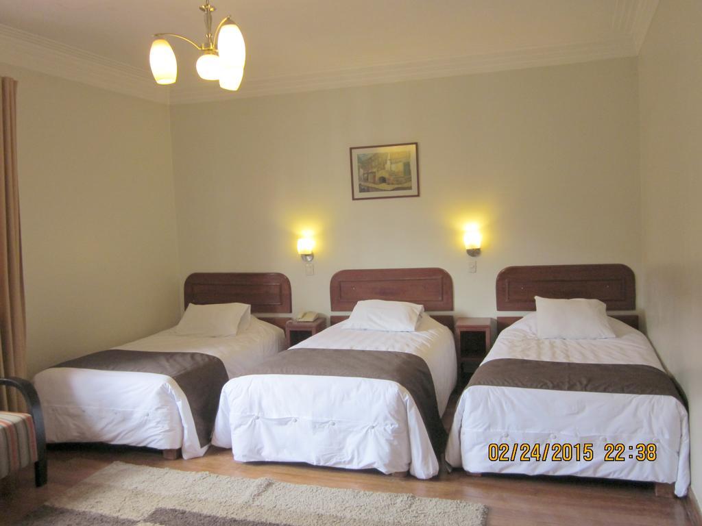 Dreibettzimmer