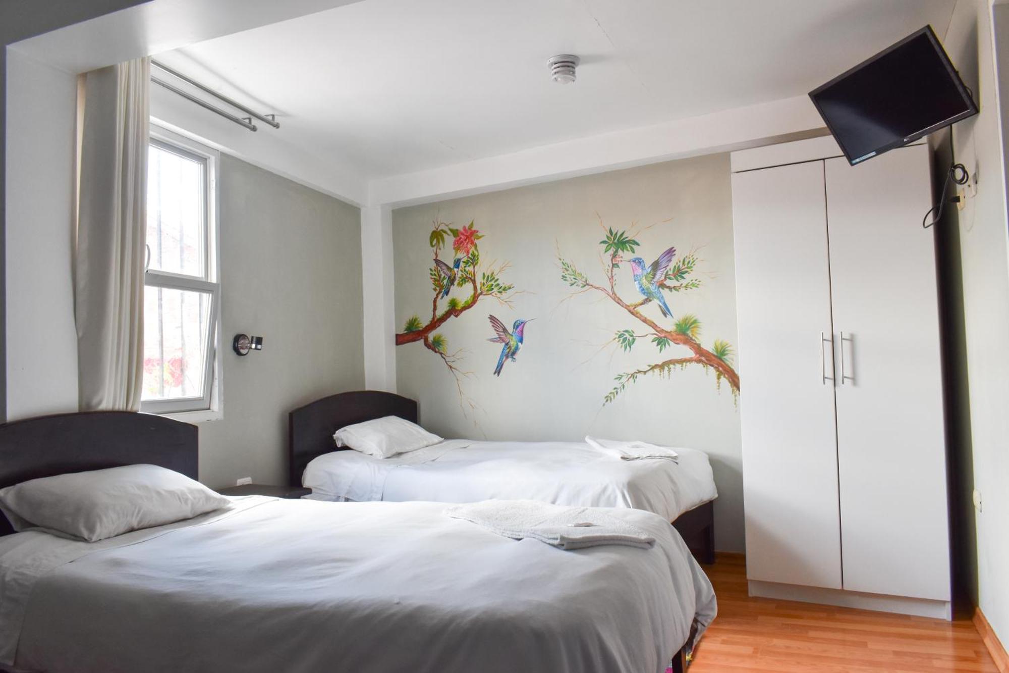 Dreibettzimmer mit eigenem Bad